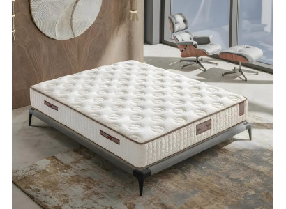 Eleganten bel postelja z moderno vzmetnico