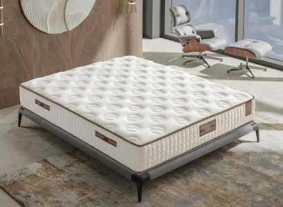 Eleganten bel postelja z moderno vzmetnico