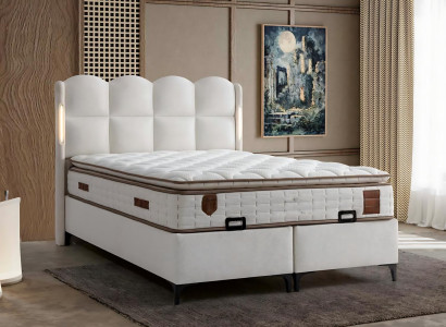 Eleganten bel postelja z moderno vzmetnico