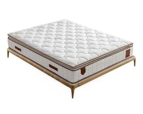 Eleganten bel postelja z moderno vzmetnico