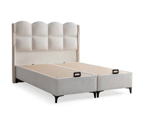 Eleganten bel postelja z moderno vzmetnico