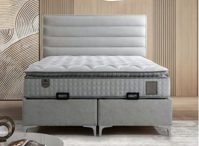 Postelja iz modernega sivega blaga z elegantno vzmetnico