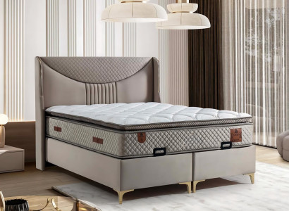 Postelja z vzmetnico polepša katero koli sobo.